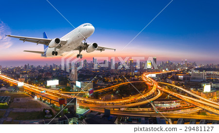 Airplane take off over the panorama city Airplane take off over the panorama city 29481127
