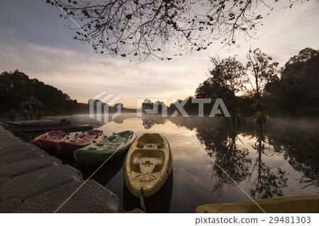 Silhouette scenery during sunrise with kayak 29481303