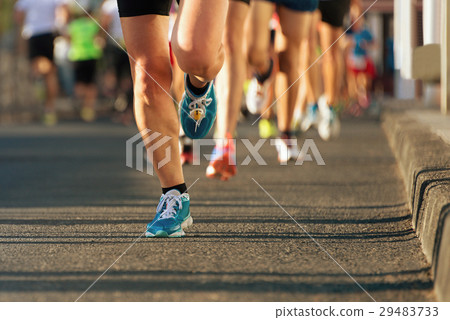 Marathon running in the light of evening 29483733