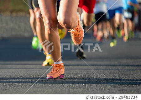 Marathon running in the light of evening 29483734