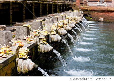 Holy spring water in Tirta Empul 29486806