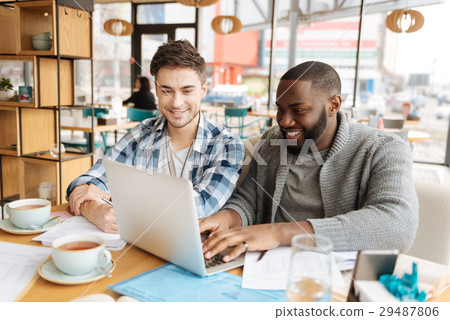 Positive students workign together Positive students workign together 29487806