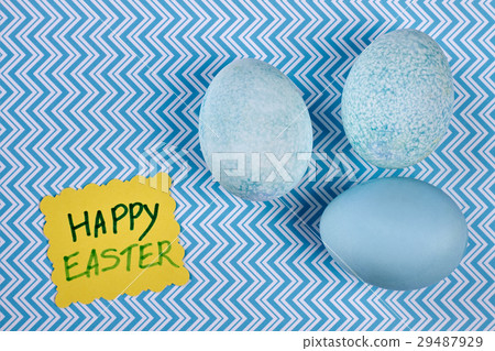 Dyed eggs on blue suraface. 29487929
