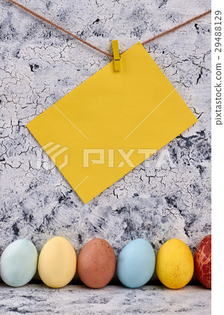Row of painted chicken eggs. 29488129