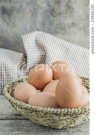 Close up of eggs in a basket. Close up of eggs in a basket. 29488180