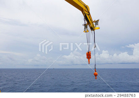 Crane boom and crane lighting in the sea  29488763