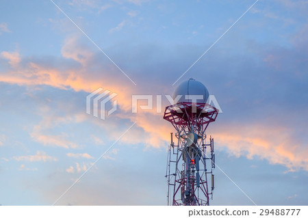 Radar dome in the sea with blue sky and clouds. 29488777