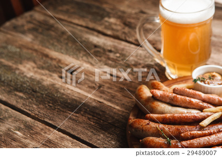 Grill sausages mix with beer, free space on wood Grill sausages mix with beer, free space on wood 29489007