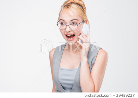 Aggressive woman screaming and yelling on phone 29489227