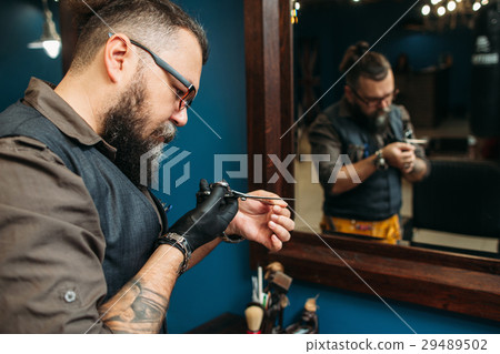 Barber check scissors sharpness before work day 29489502