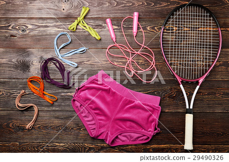 Sport equipment on wooden background. Sport equipment on wooden background. 29490326