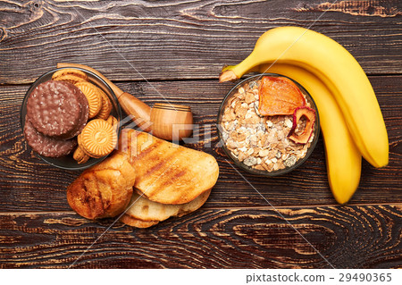 Bananas, muesli, bread and cookies. Bananas, muesli, bread and cookies. 29490365