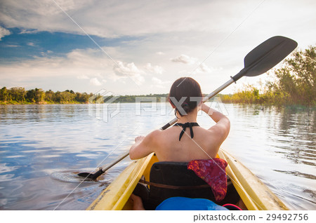 woman with kayak on the Amazon woman with kayak on the Amazon 29492756