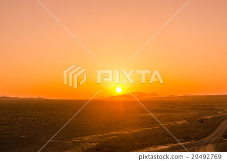 orange sunrise in the desert of Iran 29492769