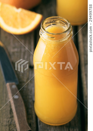 Close-up of bottle of fresh orange juice 29499788