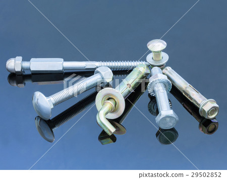 Hanging bolts and nuts on a blue background 29502852