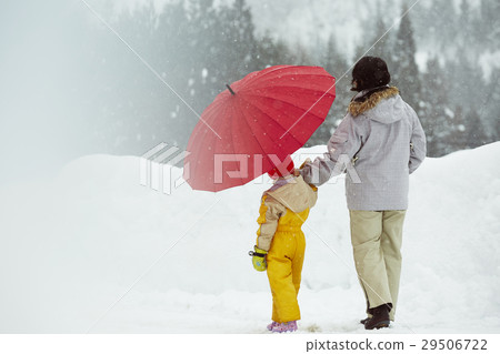 Walking family in the snow country Walking family in the snow country 29506722