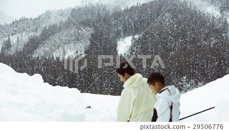 Snow shovel family living in the snow country 29506776