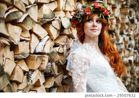 Boho bride with red hair with flowers Boho bride with red hair with flowers 29507632