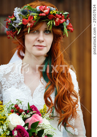 Boho bride with red hair with flowers Boho bride with red hair with flowers 29507634