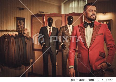 Extravagant stylish man in tailor studio 29507768