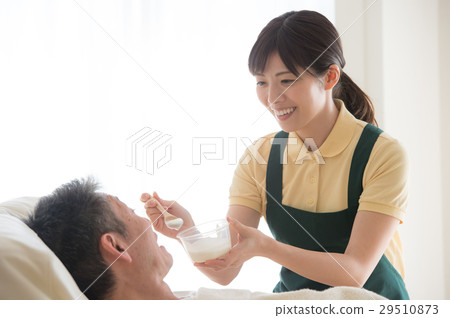 Meal assistance senior and caregiver 29510873