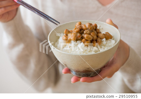 Female hand to eat natto rice Female hand to eat natto rice 29510955