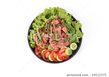 Spicy fried pork with herb in shrimp paste dip . Spicy fried pork with herb in shrimp paste dip . 29512575