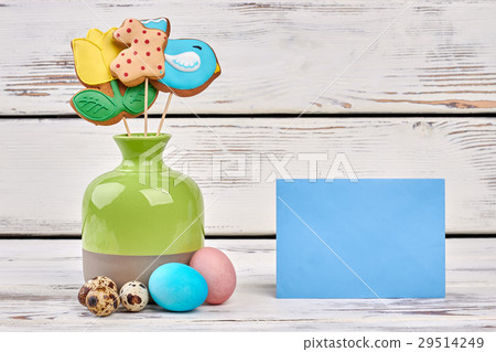 Vase with cookies and card. Vase with cookies and card. 29514249