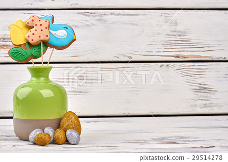 Vase and shiny Easter eggs. Vase and shiny Easter eggs. 29514278