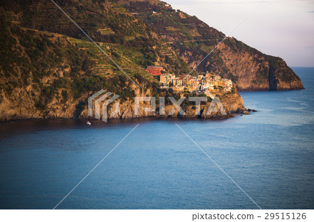 Manarola in Cinque Terre seen at dusk across the s Manarola in Cinque Terre seen at dusk across the s 29515126