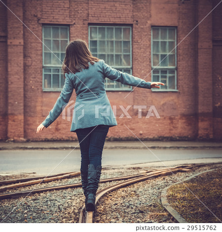 girl walking on the railway girl walking on the railway 29515762