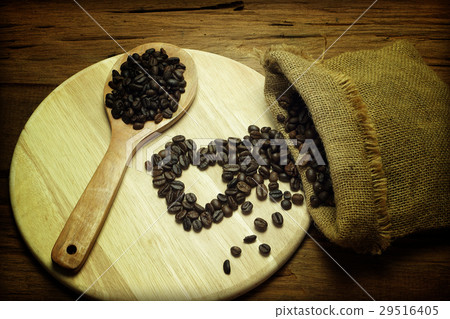 heart from coffee beans on old wood 29516405