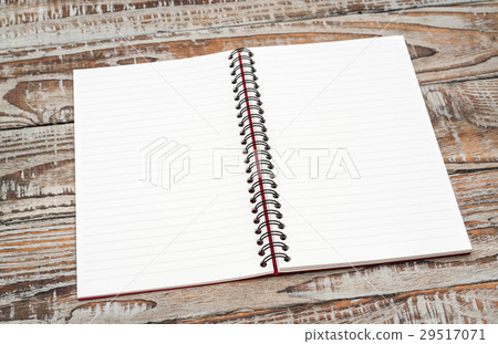 Blank notebook mock up on wood background . Blank notebook mock up on wood background . 29517071
