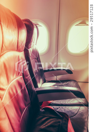 Airplane seats in the cabin . ( Filtered image processed vintage effect. ) 29517128