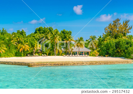 Beautiful tropical Maldives island with white sandy beach and sea . 29517432
