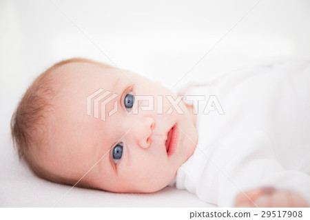 Cute adorable newborn baby girl in white bed and Cute adorable newborn baby girl in white bed and 29517908