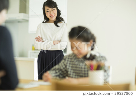 Mother watching daughter 29527860