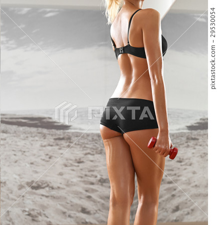 Sexy, athletic, blonde woman in the gym, against Sexy, athletic, blonde woman in the gym, against 29530054