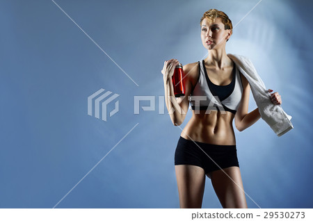 Sexy woman wearing sports top and shorts Sexy woman wearing sports top and shorts 29530273