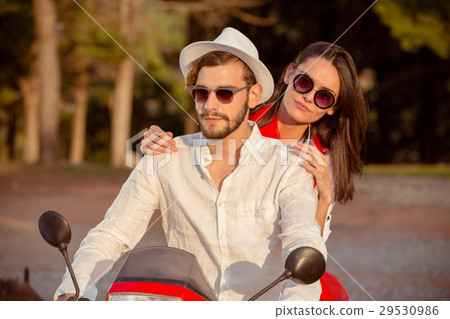 Couple in love riding a motorbike , Handsome guy 29530986