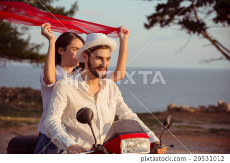 Couple in love riding a motorbike , Handsome guy 29531012
