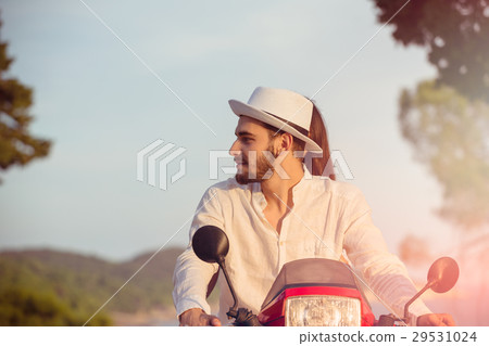 Couple in love riding a motorbike , Handsome guy Couple in love riding a motorbike , Handsome guy 29531024