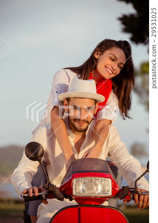 Couple in love riding a motorbike , Handsome guy 29531025