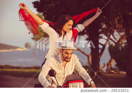 Couple in love riding a motorbike , Handsome guy Couple in love riding a motorbike , Handsome guy 29531031