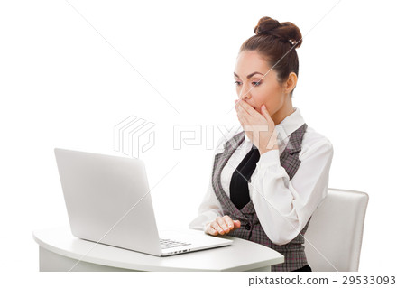 Surprised businesswoman at work. Obscene content 29533093