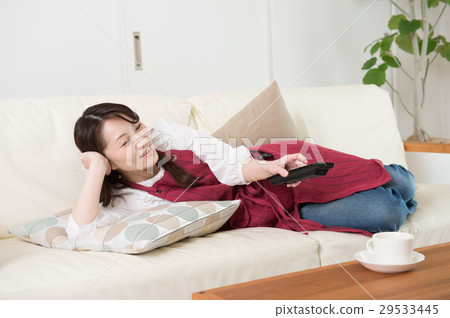 Housewives lying down on the sofa 29533445