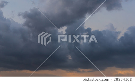 rain cloud on sunset sky background rain cloud on sunset sky background 29534108