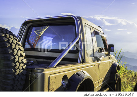he Off Road car on the mountain with blue sky he Off Road car on the mountain with blue sky 29539147