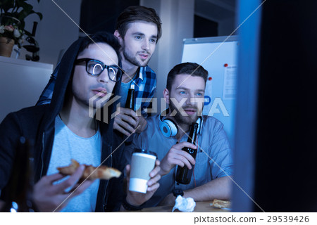 Handsome male colleagues spending time together Handsome male colleagues spending time together 29539426